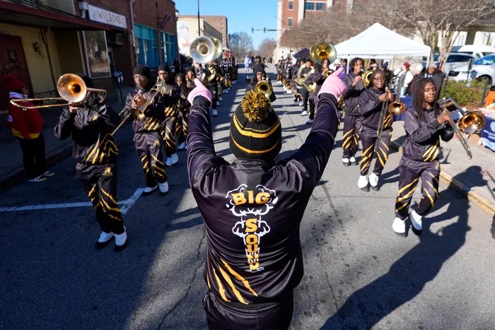 Marching band performing in downtown Athens, from the United GA website archive.