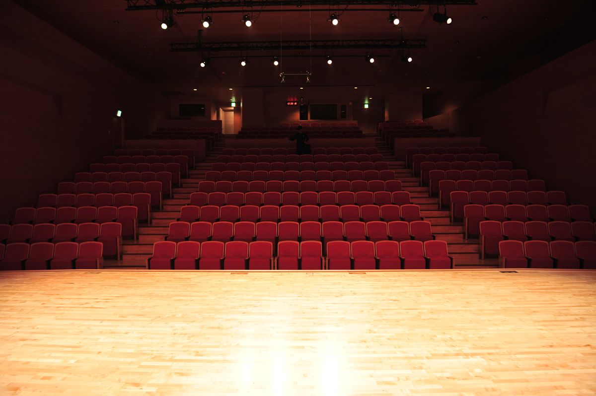 Theater stage and auditorium — illustrative venue photography.